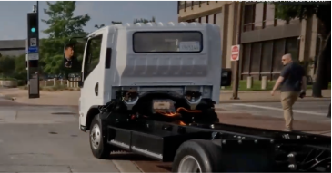 Electric truck on city street Electric truck on city street